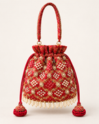 Studio front view of the red Gulnaar Bandhej potli with gold embroidery, pearl detailing and matching tassels.