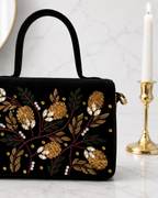 Close-up of hand-embroidered gold zardozi and crystal grape motif on Nocturne Satchel, Noir Atelier by The House of Shine