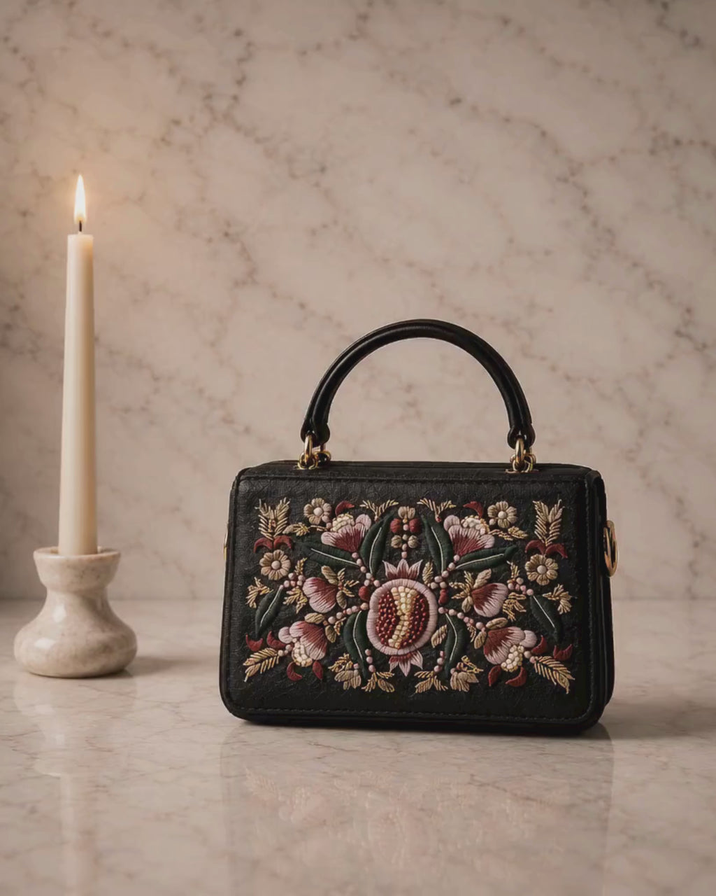 The House of Shine Florence hand-embroidered satchel — close-up detail of pomegranate floral motif in silk thread, pearl beads and gold embellishment