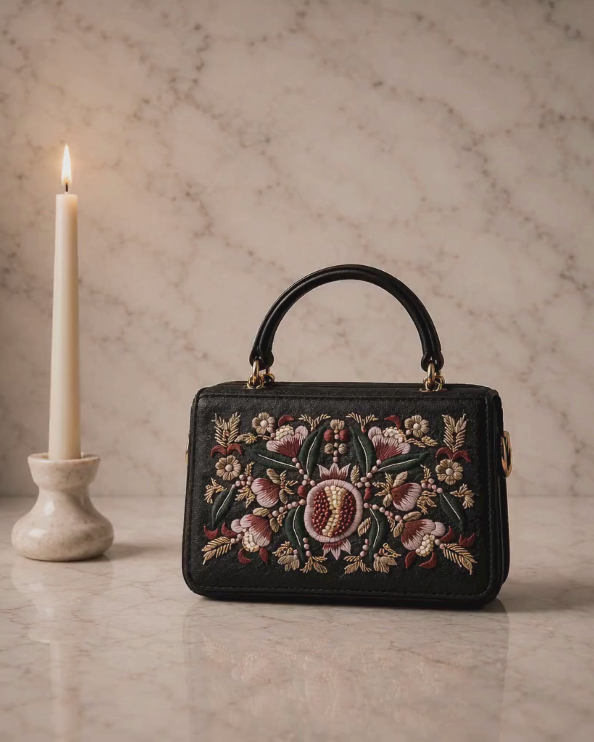 The House of Shine Florence hand-embroidered satchel — close-up detail of pomegranate floral motif in silk thread, pearl beads and gold embellishment